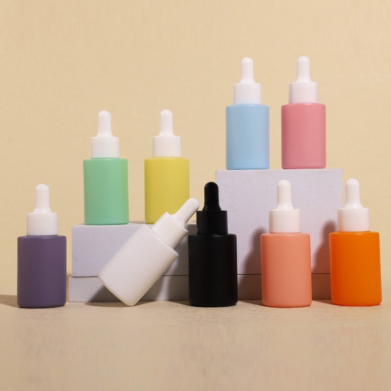In stock 30ml Flat Shoulder Multi-Colored Cosmetic Glass Oil Bottle Dropper Skincare Packaging Custom Essential Oil Bottle