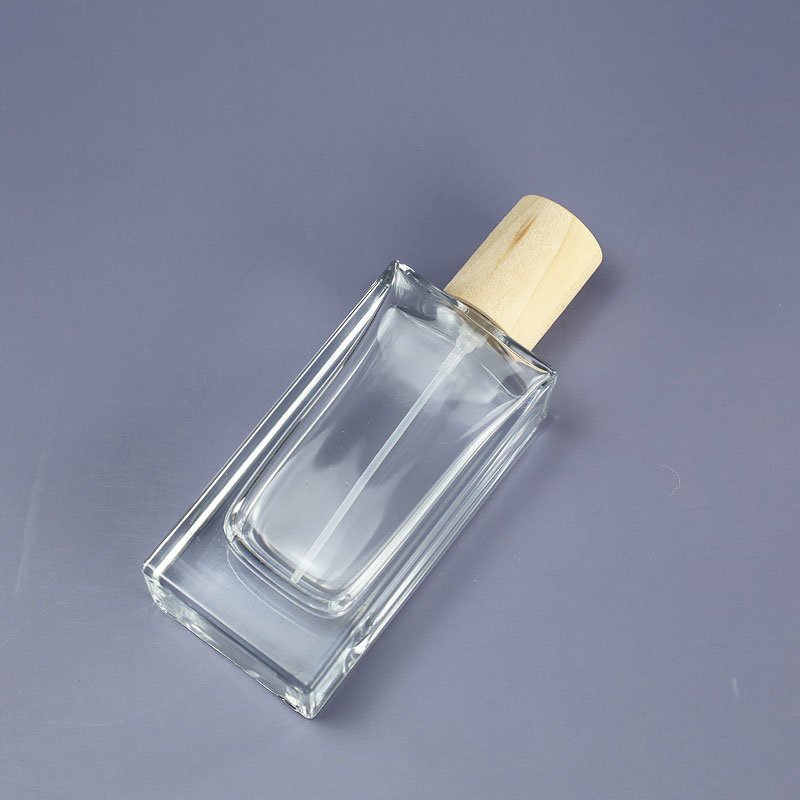 High quality 30ml 50ml 100ml personalized glass perfume bottle with wooden lid and box