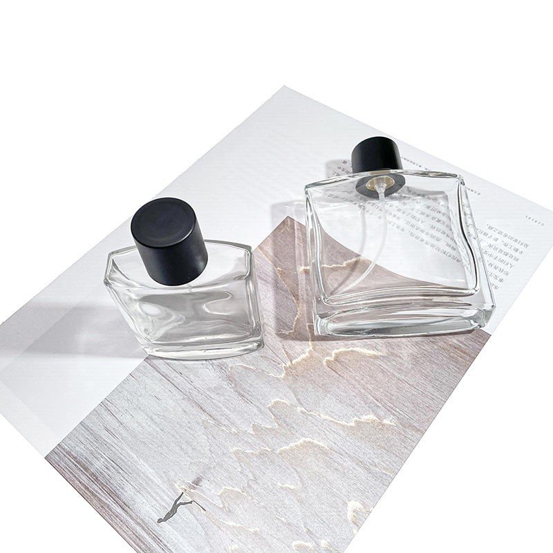 Wholesale 50ml 100ml Luxury Flat Square Glass Perfume Glass Bottle With Sprayer And Lid