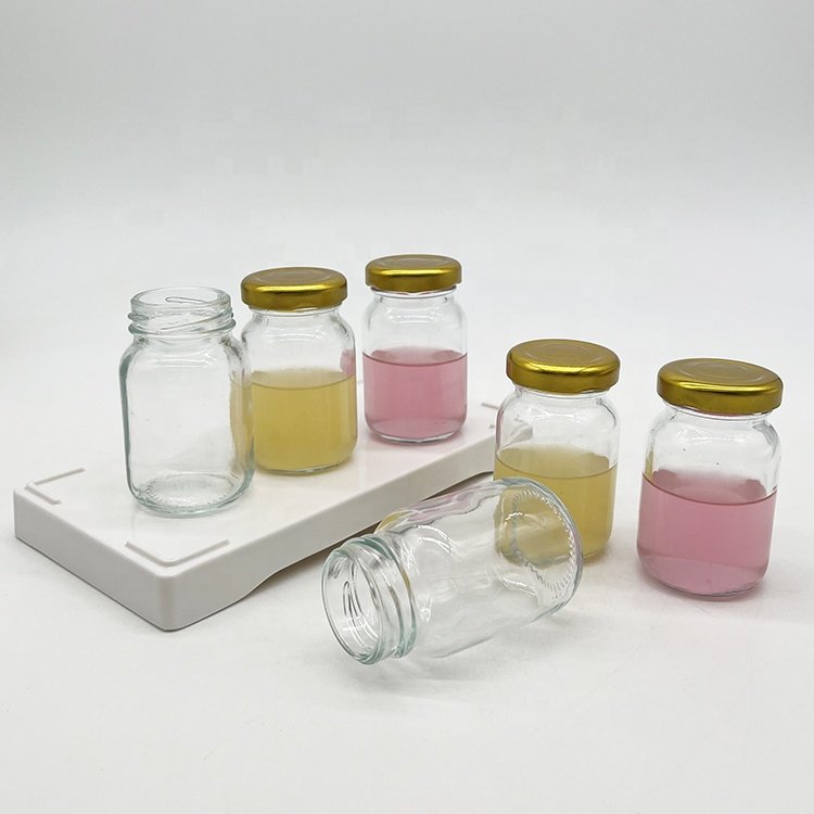 80ml New Arrival 80ml Clear Round Ginger Juice Glass Bottle with Twist Off Lug Glass Honey Bottle with Metal Lid