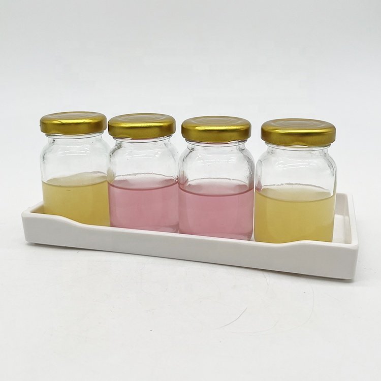 80ml New Arrival 80ml Clear Round Ginger Juice Glass Bottle with Twist Off Lug Glass Honey Bottle with Metal Lid