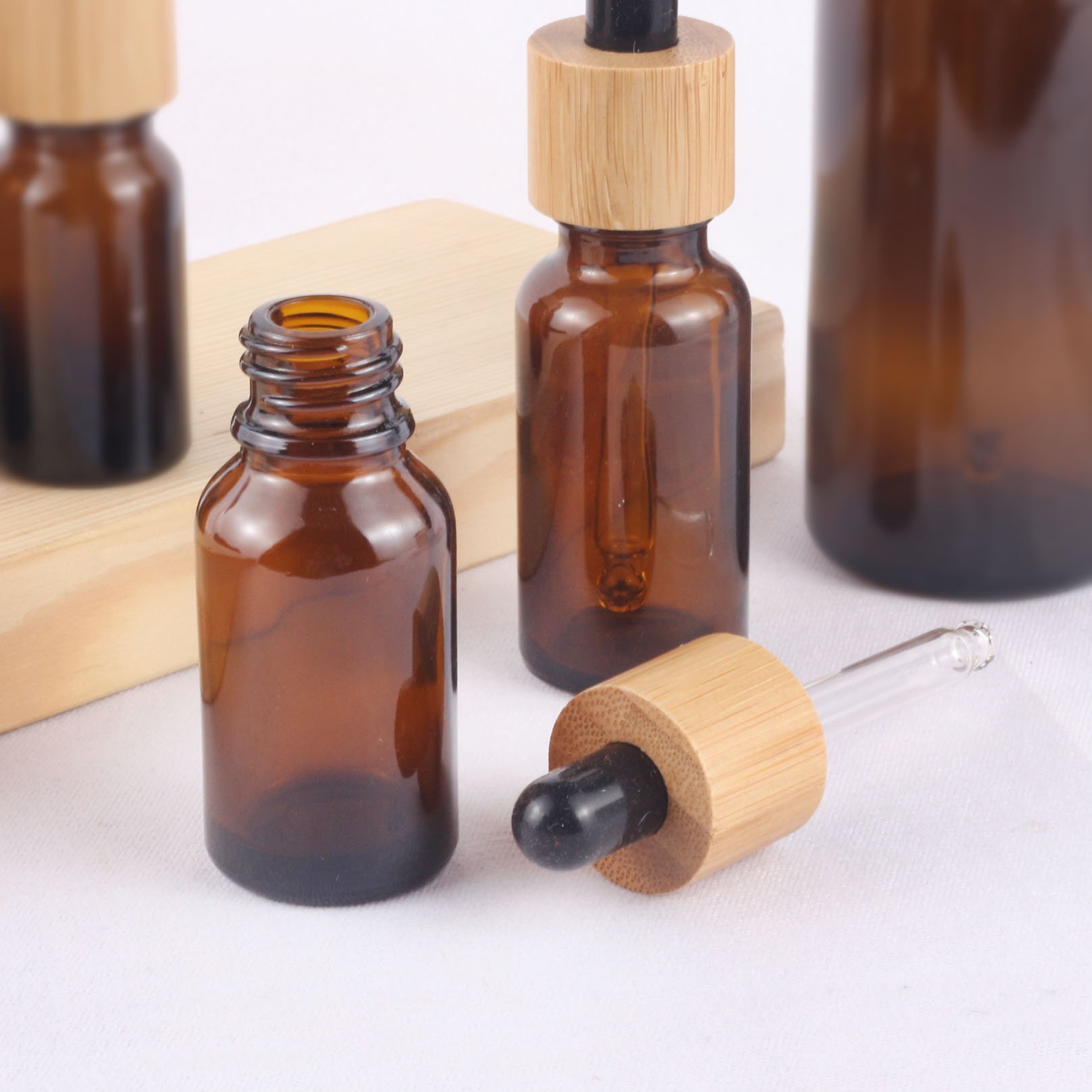 Factory Original Stock Price Cosmetic Packaging 30 Ml Essential Oil Bamboo Cap Dropper Glass Bottles