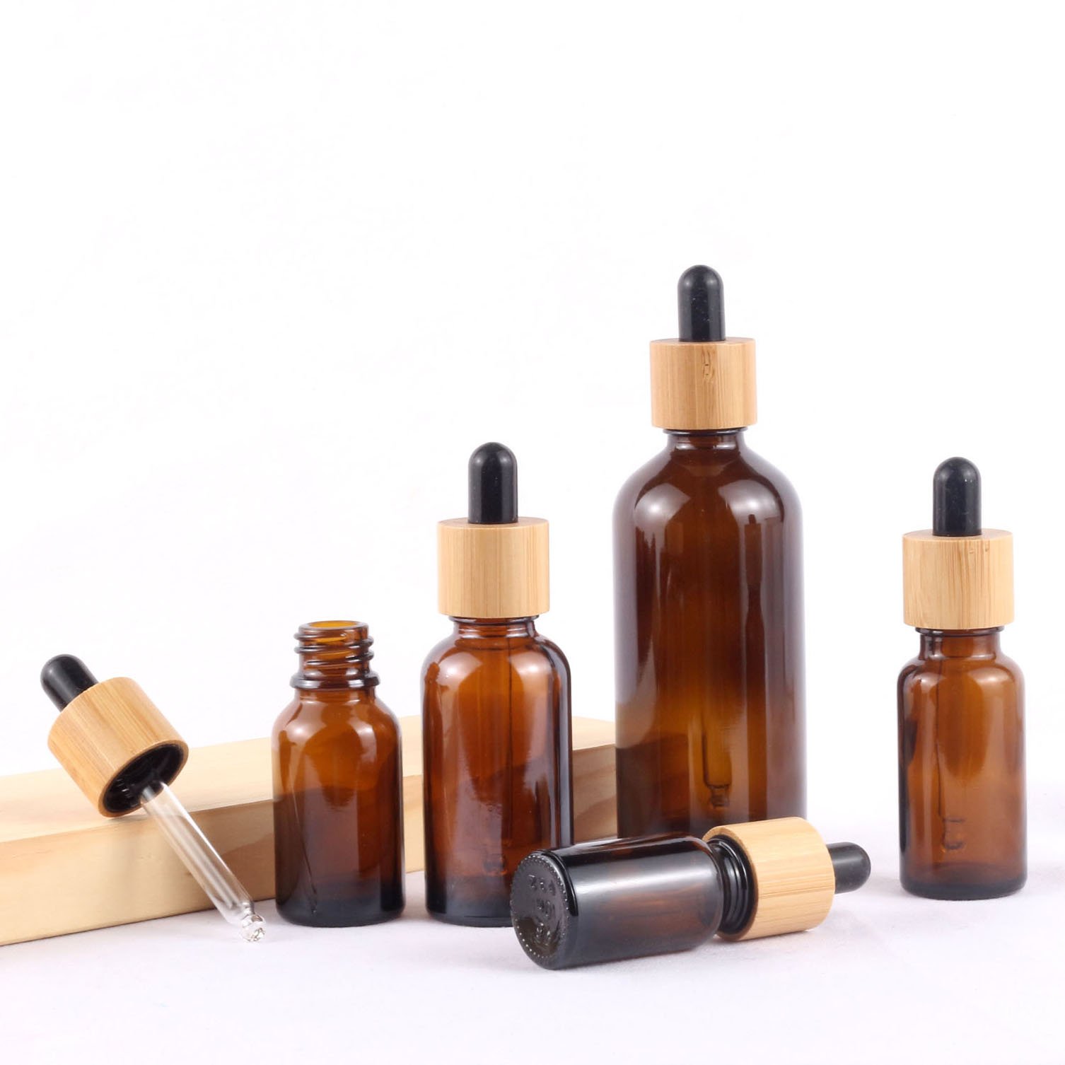 Factory Original Stock Price Cosmetic Packaging 30 Ml Essential Oil Bamboo Cap Dropper Glass Bottles