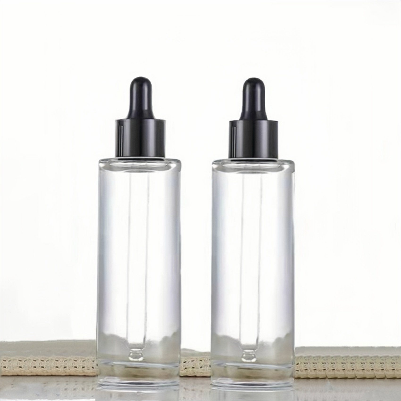 Thick bottom luxury dropper serum bottle 15ml 20ml 30ml 40ml 50ml clear flat shoulder glass bottles for essential oils