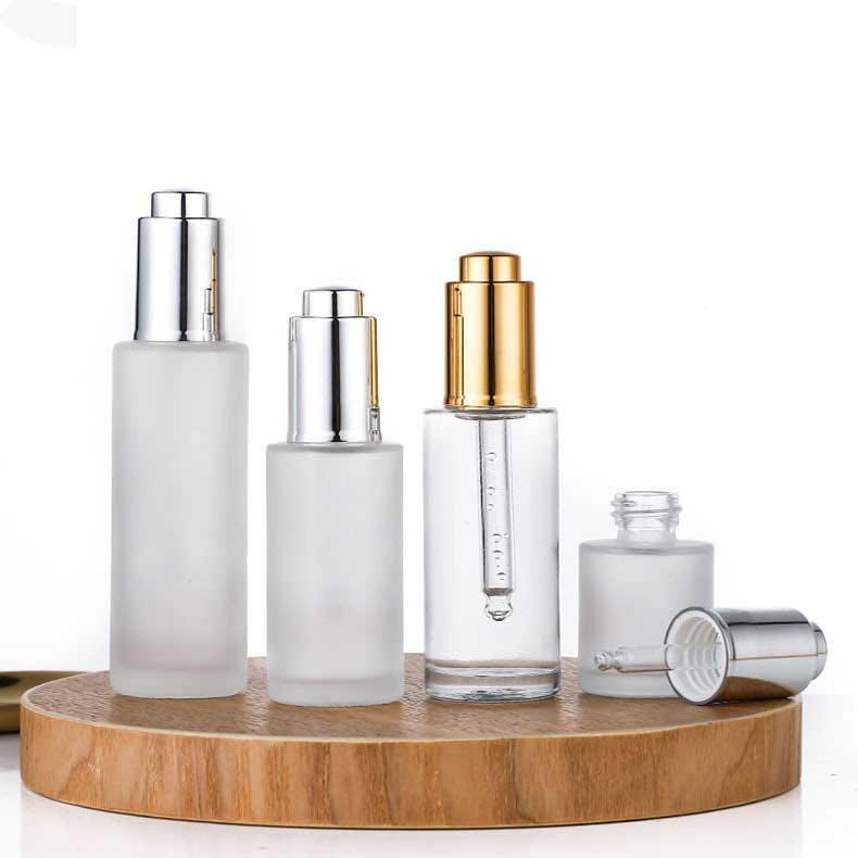 In Stock 15ml 20ml 30ml 40ml 50ml 60ml 80ml 100ml Clear Frosted serum glass dropper bottle with Gold Silver push dropper