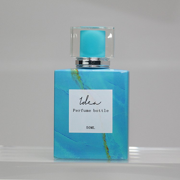 Custom Decoration New Design Professional Vacuum Heat Transfer Sky Blue Marbling Spray-head 75ml Perfume Glass Bottle