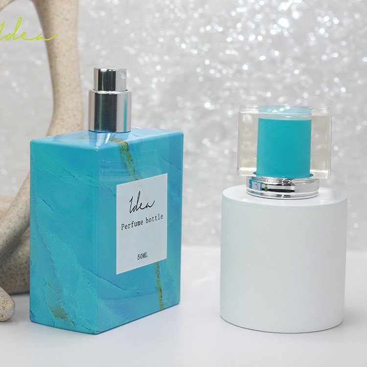 Custom Decoration New Design Professional Vacuum Heat Transfer Sky Blue Marbling Spray-head 75ml Perfume Glass Bottle
