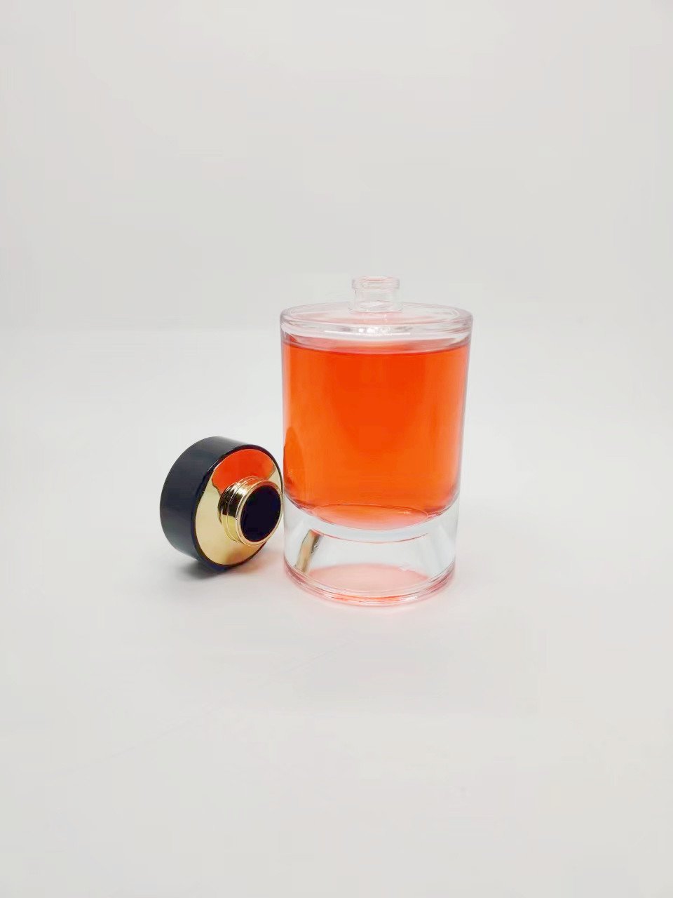 High quality 30ml 50 ml 100ml luxury Cylinder perfume glass bottle with round perfume cap