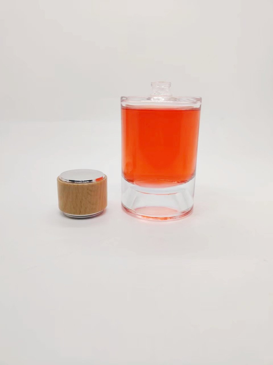 High quality 30ml 50 ml 100ml luxury Cylinder perfume glass bottle with round perfume cap