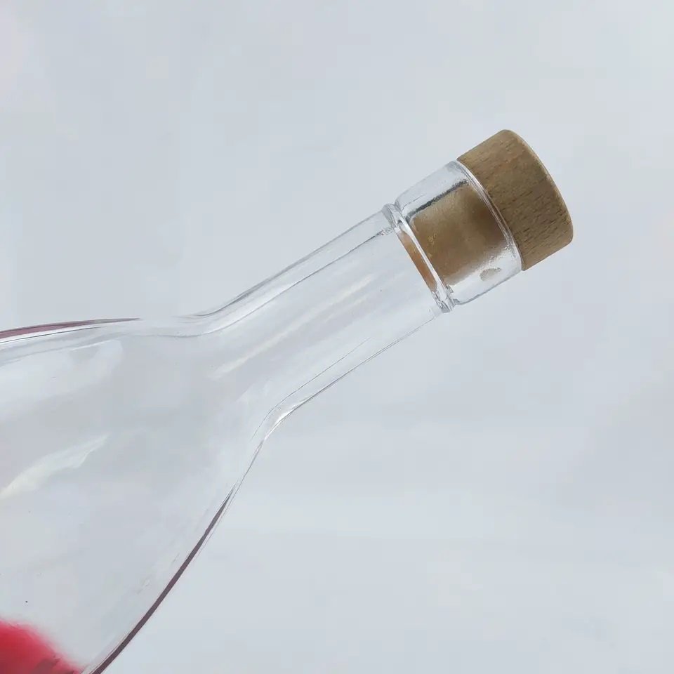 Hot selling wholesale round shape 375ml 500ml 750ml glass bottles frosted glass water bottle with cork