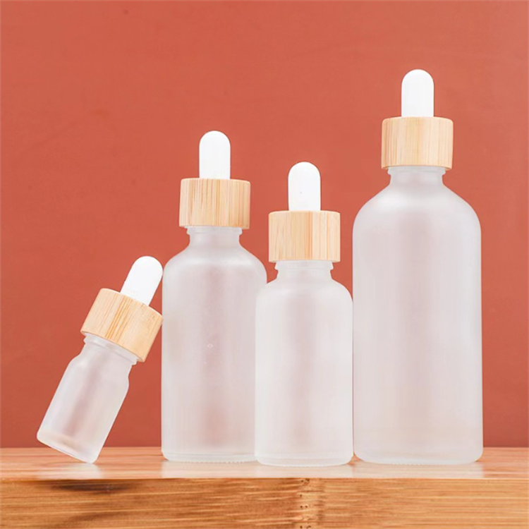 10ml 15ml 20ml 30ml clear amber cosmetics empty frosted white essential oil dropper bottle with Bamboo Lids