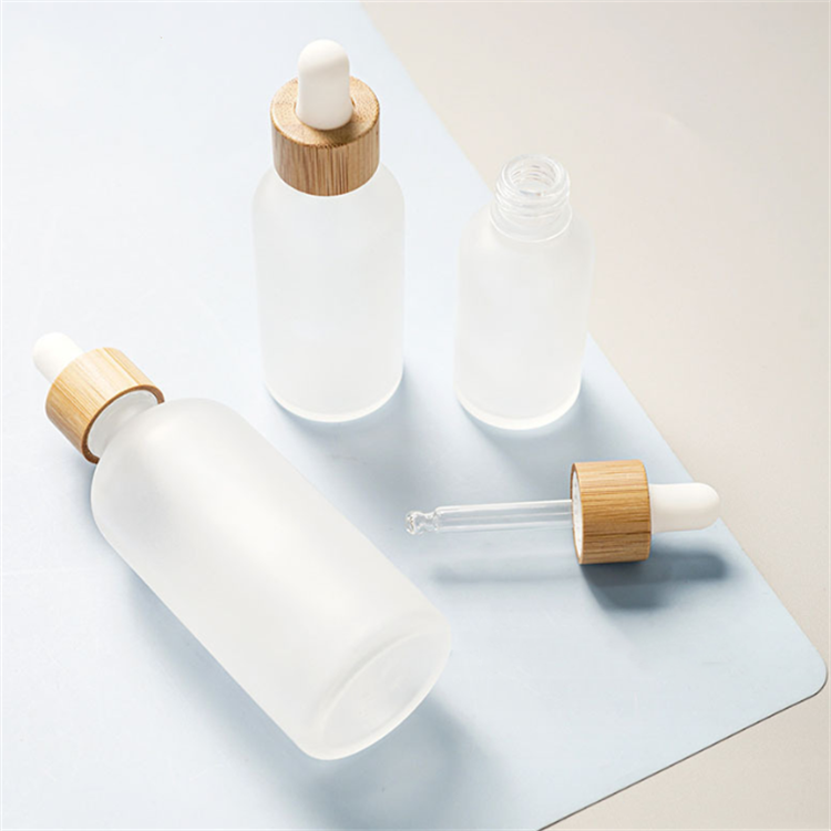 10ml 15ml 20ml 30ml clear amber cosmetics empty frosted white essential oil dropper bottle with Bamboo Lids