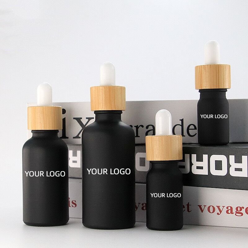 10ml 20ml 30ml 50ml 100ml 1oz Empty Essential Oil Glass Bottle 50ml Transparent Frosted Bamboo Cap Dropper Glass Bottle
