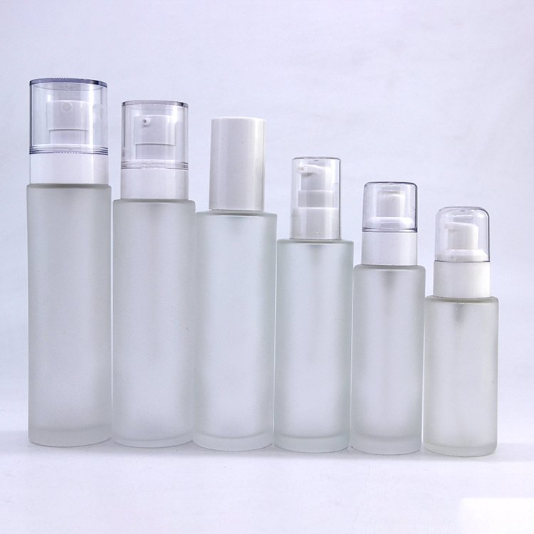 Supply wholesale empty frosted glass lotion bottle for skin care 30ml 100ml cosmetic pump glass spray bottle manufacturers