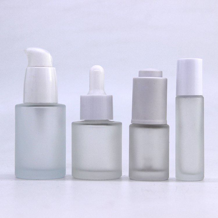 Supply wholesale empty frosted glass lotion bottle for skin care 30ml 100ml cosmetic pump glass spray bottle manufacturers