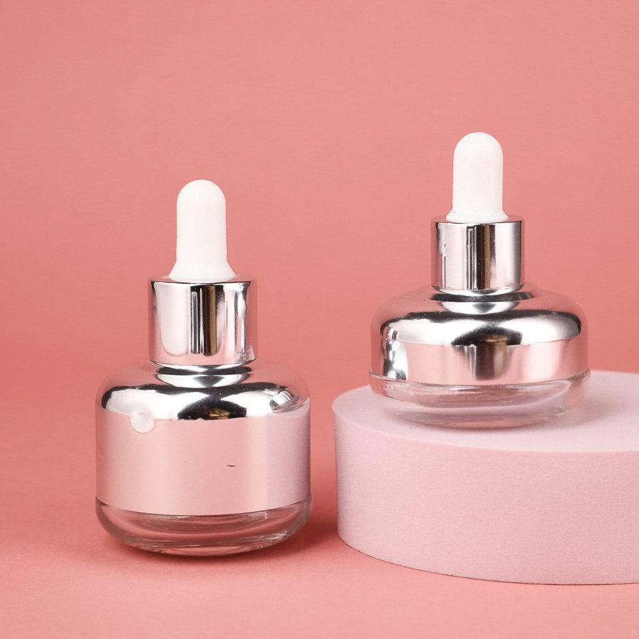Luxury round Empty Glass 20ml-65ml Hair Serum Bottle with Silver Body Surface Essential Oil Packaging Glass Dropper Bottles