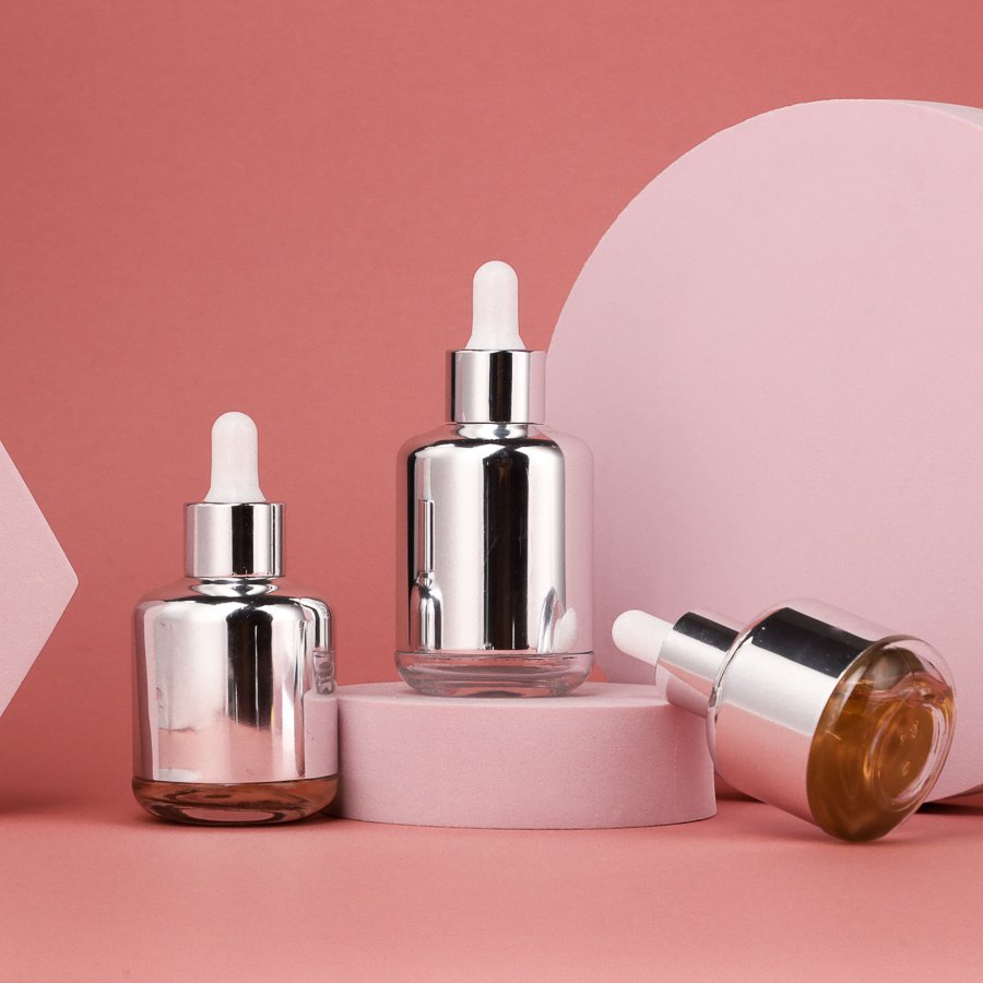Luxury round Empty Glass 20ml-65ml Hair Serum Bottle with Silver Body Surface Essential Oil Packaging Glass Dropper Bottles