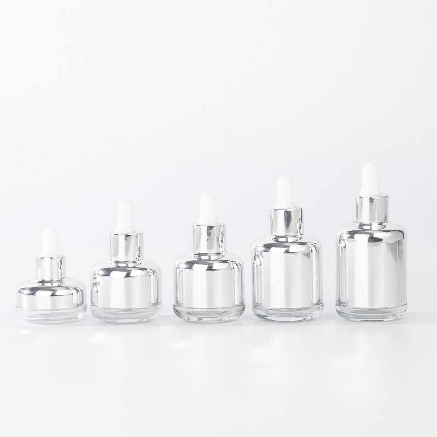 Luxury round Empty Glass 20ml-65ml Hair Serum Bottle with Silver Body Surface Essential Oil Packaging Glass Dropper Bottles