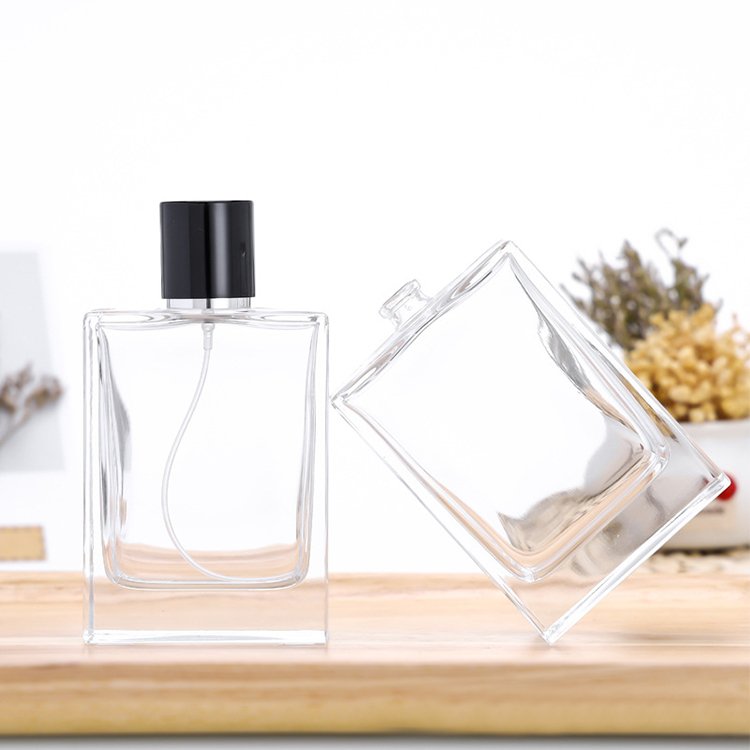 Customized 100ml glass perfume bottle luxury clear spray glass bottle