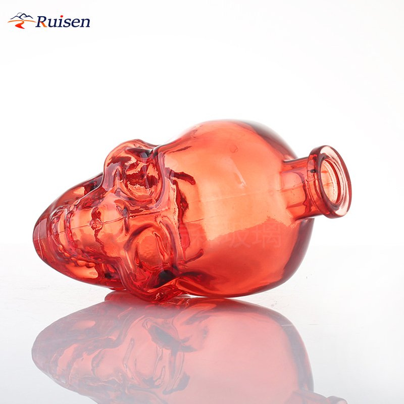 Shandong Special wholesale 750 ml unique skull-shaped whiskey glass bottles spirit bottles