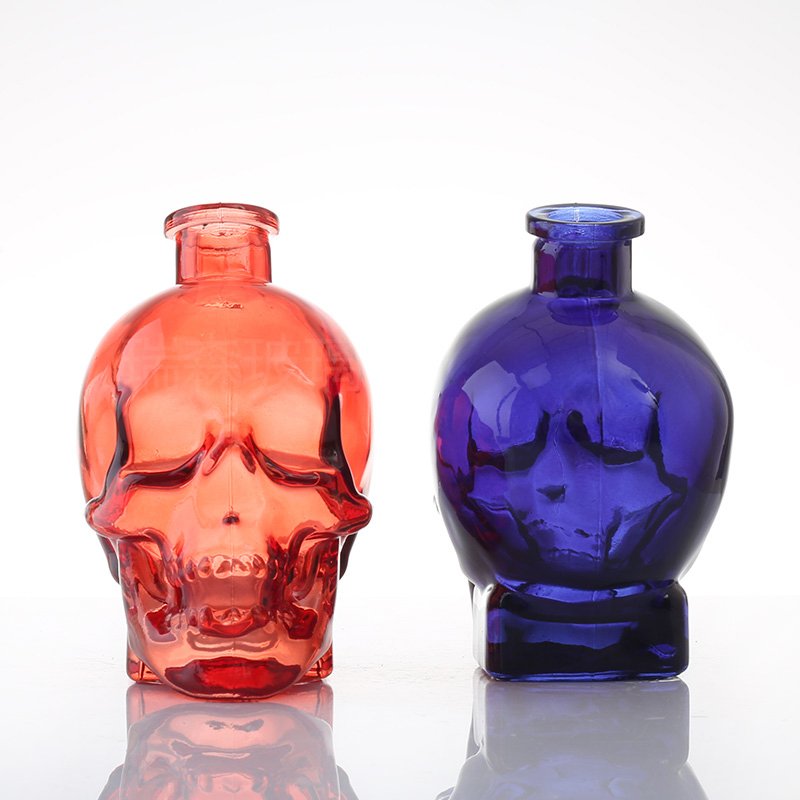 Shandong Special wholesale 750 ml unique skull-shaped whiskey glass bottles spirit bottles