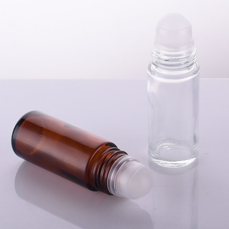 Cylinder empty round 30ml 50ml roll on antiperspirant deodorant perfume glass bottle with plastic roller ball