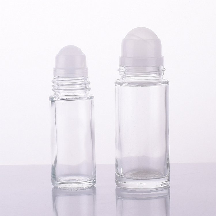 Cylinder empty round 30ml 50ml roll on antiperspirant deodorant perfume glass bottle with plastic roller ball