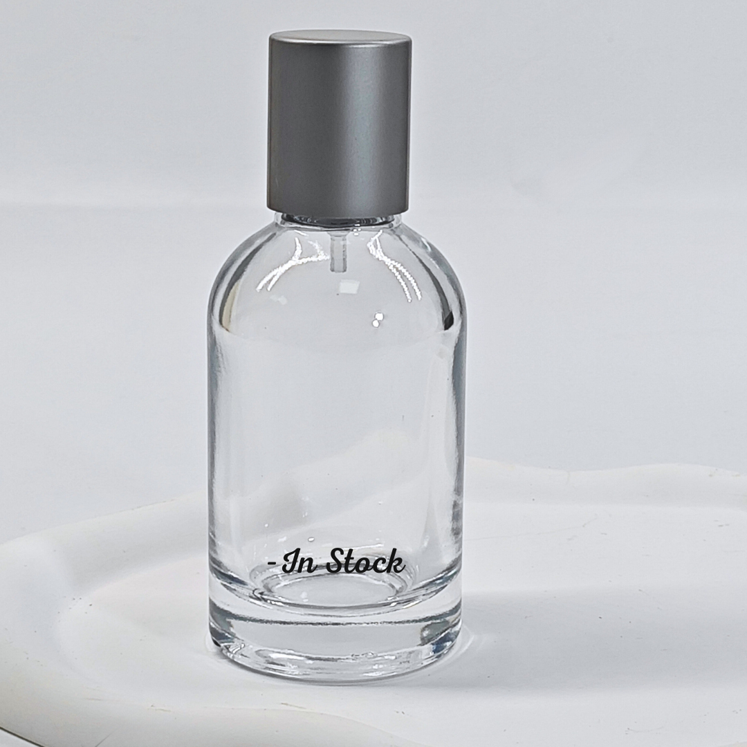 Clear empty cosmetic glass packaging for perfume 50ml glass bottle with spray pump round shape perfume packaging