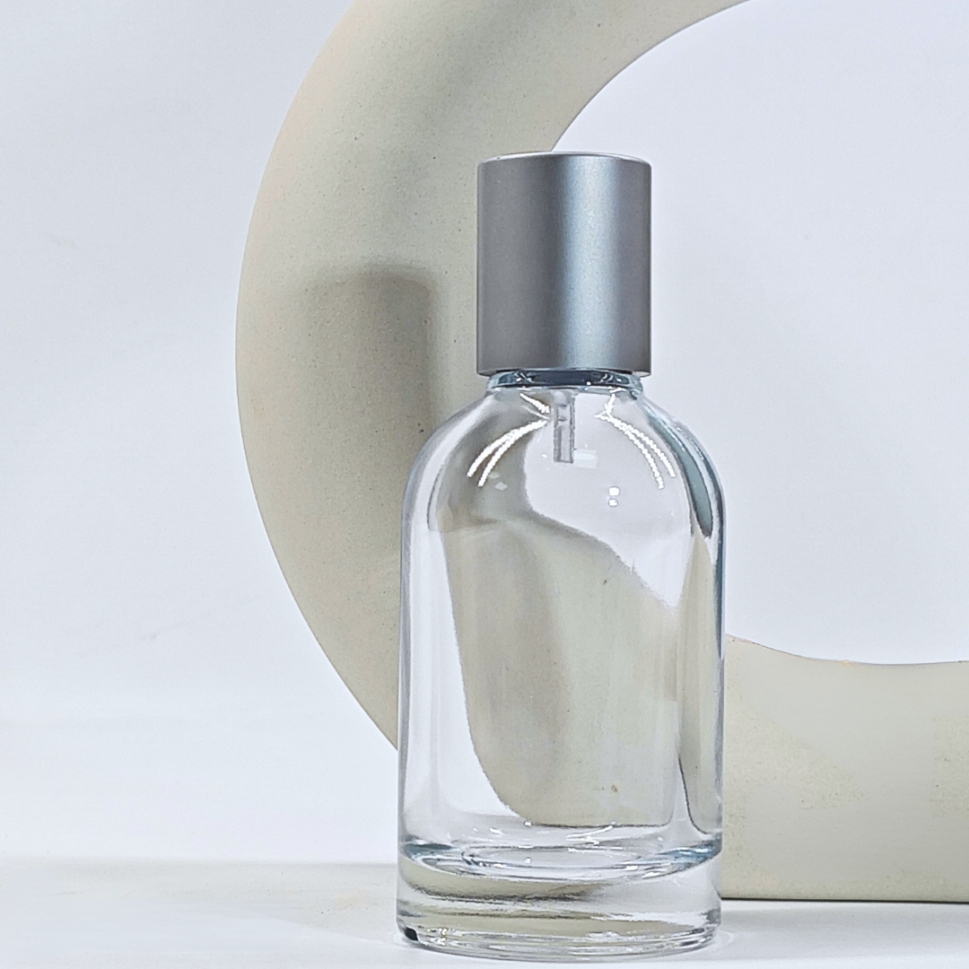 Clear empty cosmetic glass packaging for perfume 50ml glass bottle with spray pump round shape perfume packaging