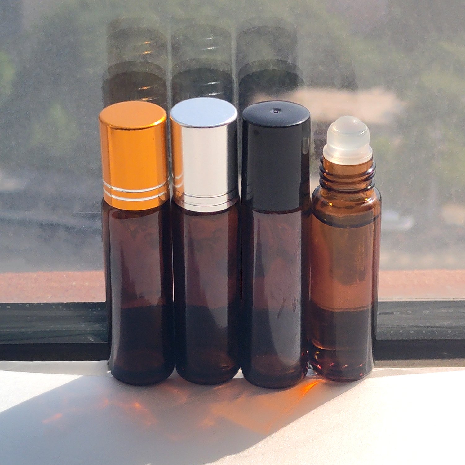 Custom empty 10ml transparent attar roll on glass bottle