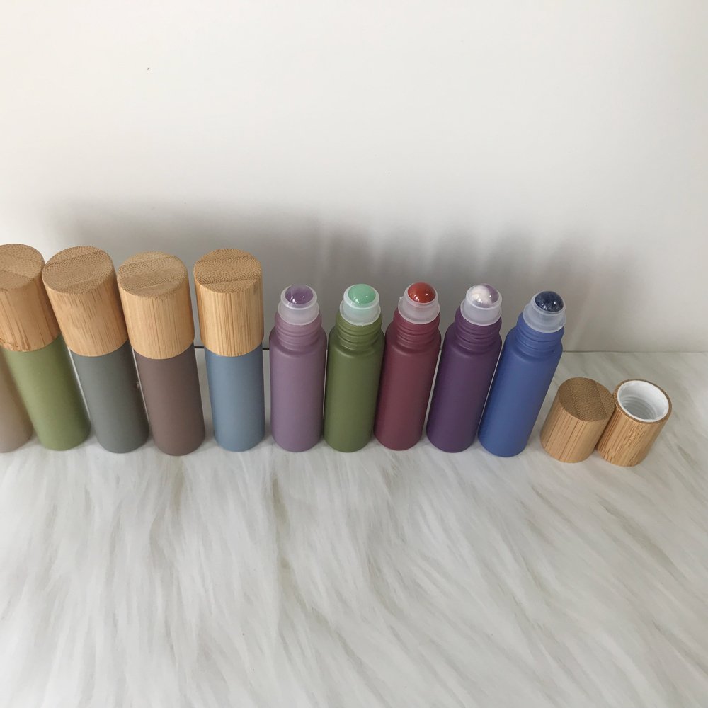 Wholesale 10ml Morandi matte colored essential oil gemstone roll on glass bottles with real bamboo cap