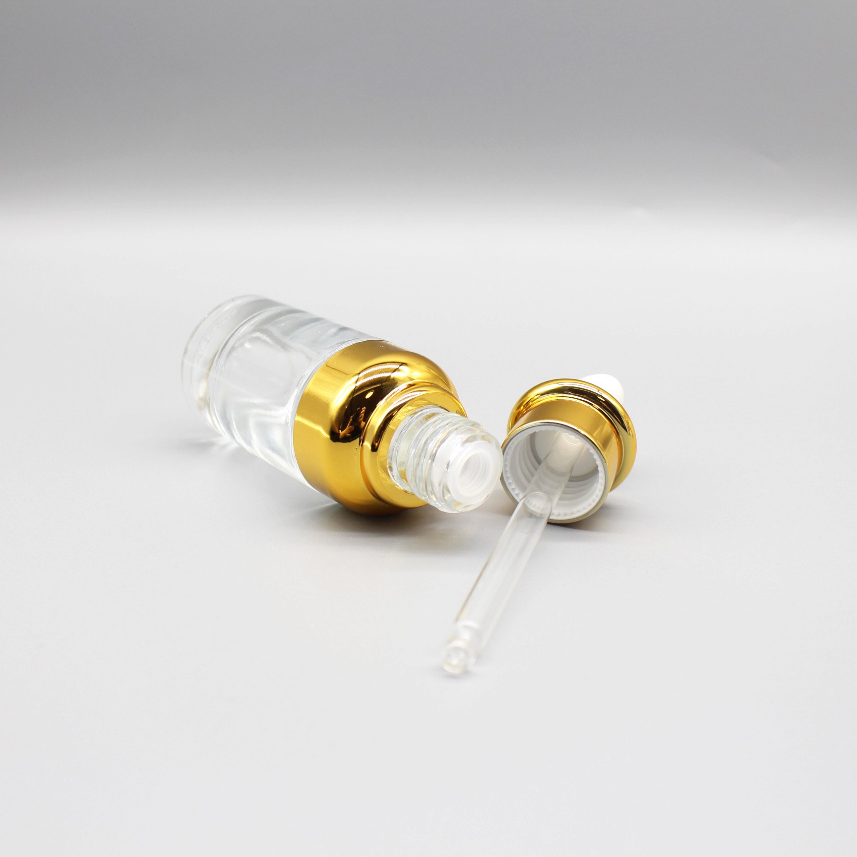 Top grade cosmetics 30ml essence stock bottle cover shoulder dropper essential oil glass bottle with paper box