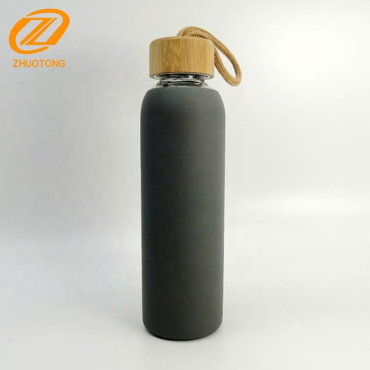 Silicone sleeve heat insulation bpa free sports glass water bottle with bamboo lid and rope