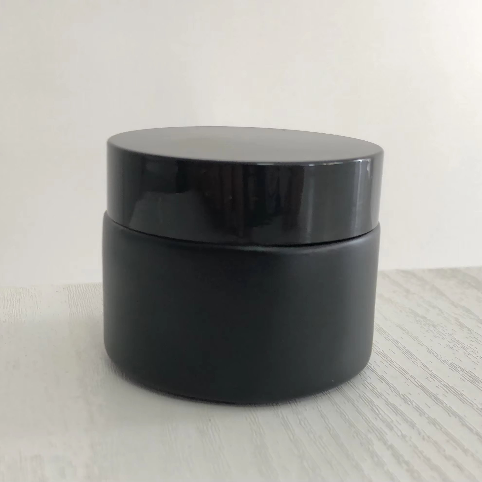 Wholesale Black glass Jars 60 Mil Cosmetic Fancy Cosmetic glass Jars Cosmetic Frosted glass Jar
