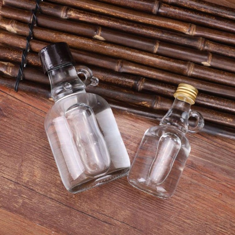 ONO Factory Price 50ml 100ml 250ml Empty Clear Small Mini California Glass Bottles With Handle For Maple Syrup
