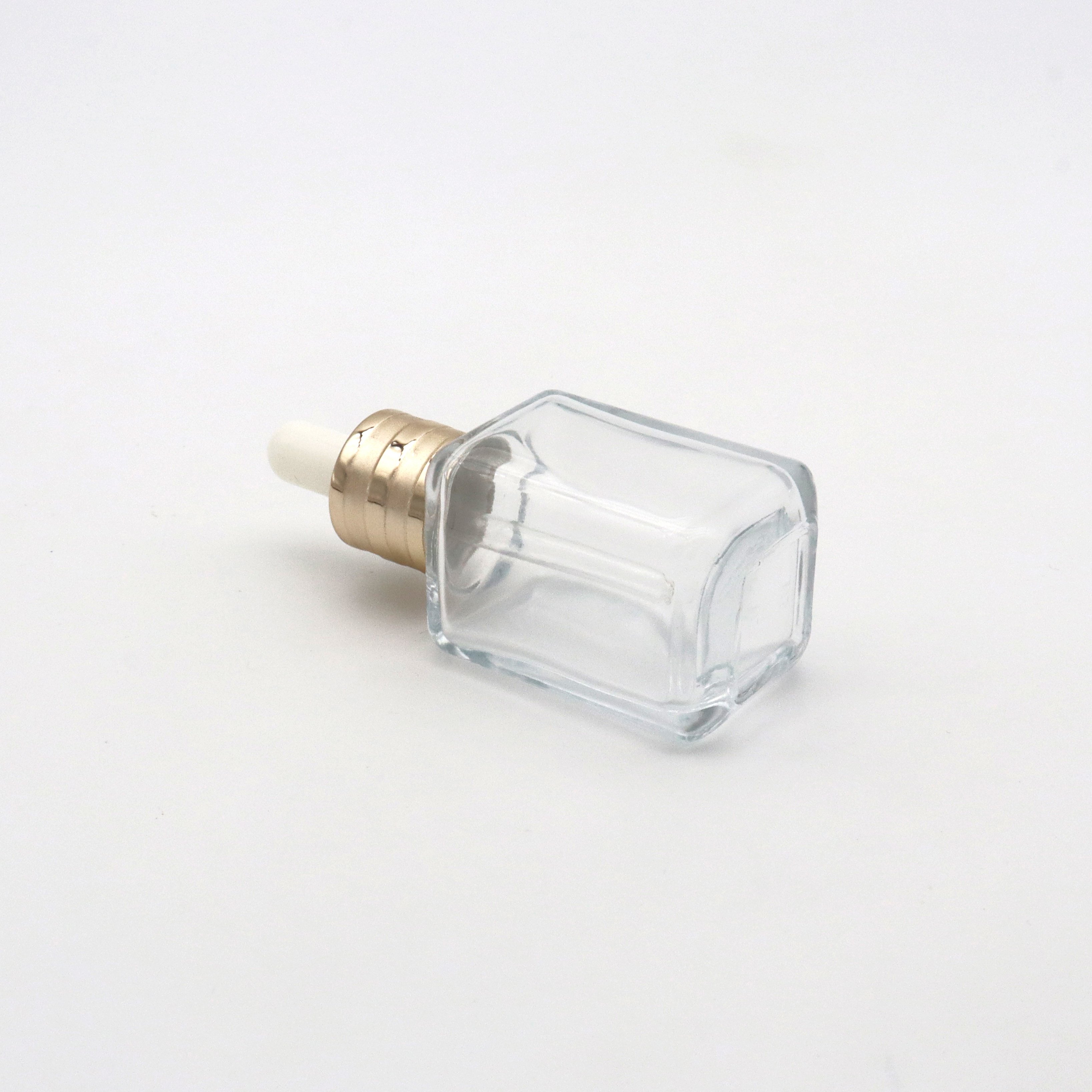 Cosmetics packaging 30 ml clear glass bottle liquid oil bottle and square glass bottle with glass dropper