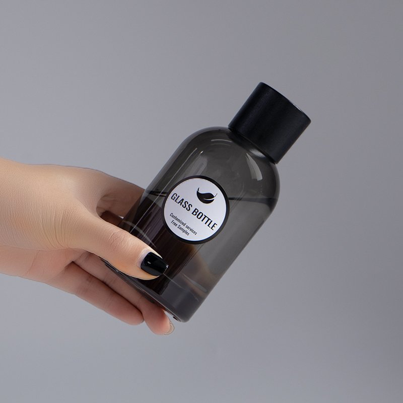 Round shape 200 ml amber black reed diffuser aroma fragrance glass bottle suppliers with wooden cap