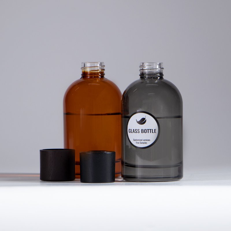 Round shape 200 ml amber black reed diffuser aroma fragrance glass bottle suppliers with wooden cap