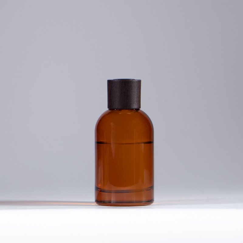 Round shape 200 ml amber black reed diffuser aroma fragrance glass bottle suppliers with wooden cap