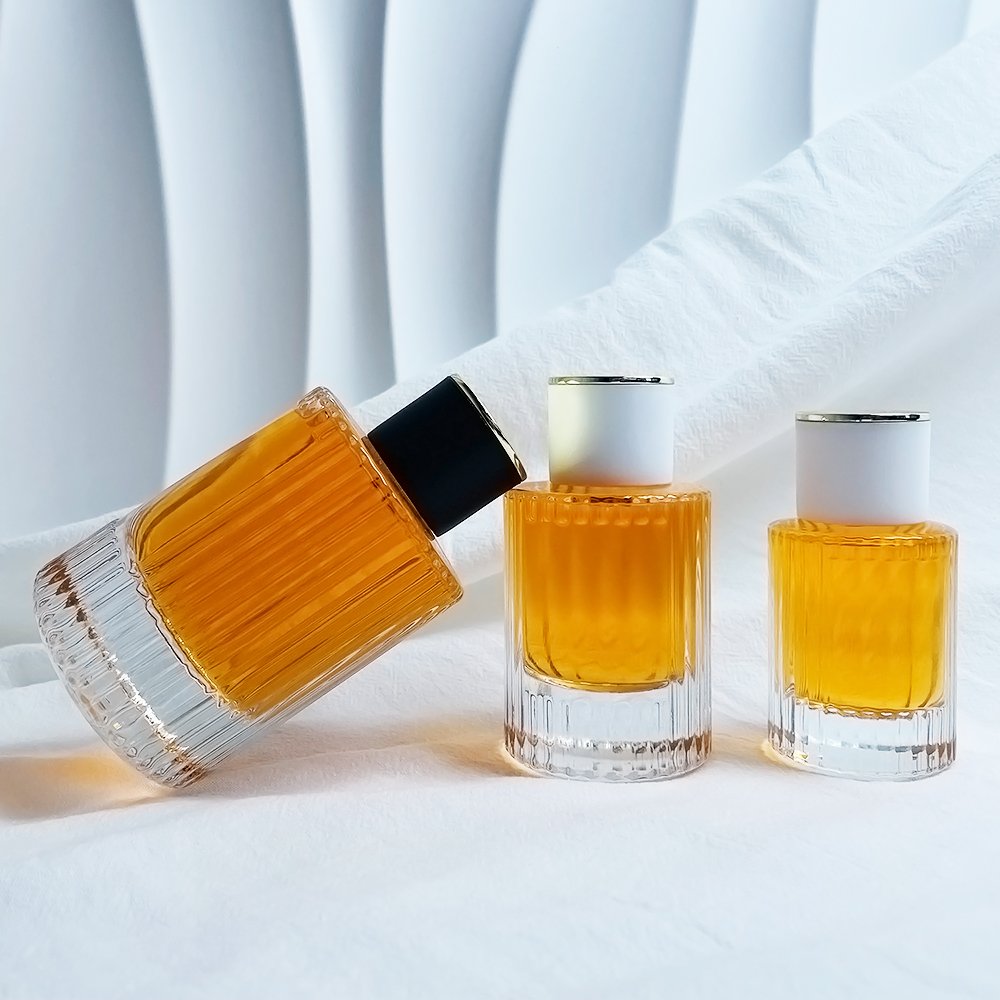Luxury 30ml 50ml 100ml Round Shaped Empty Perfume Cylinder Glass Bottles Perfume Travel Refillable Bottle Manufacturer