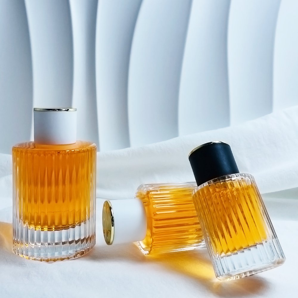 Luxury 30ml 50ml 100ml Round Shaped Empty Perfume Cylinder Glass Bottles Perfume Travel Refillable Bottle Manufacturer