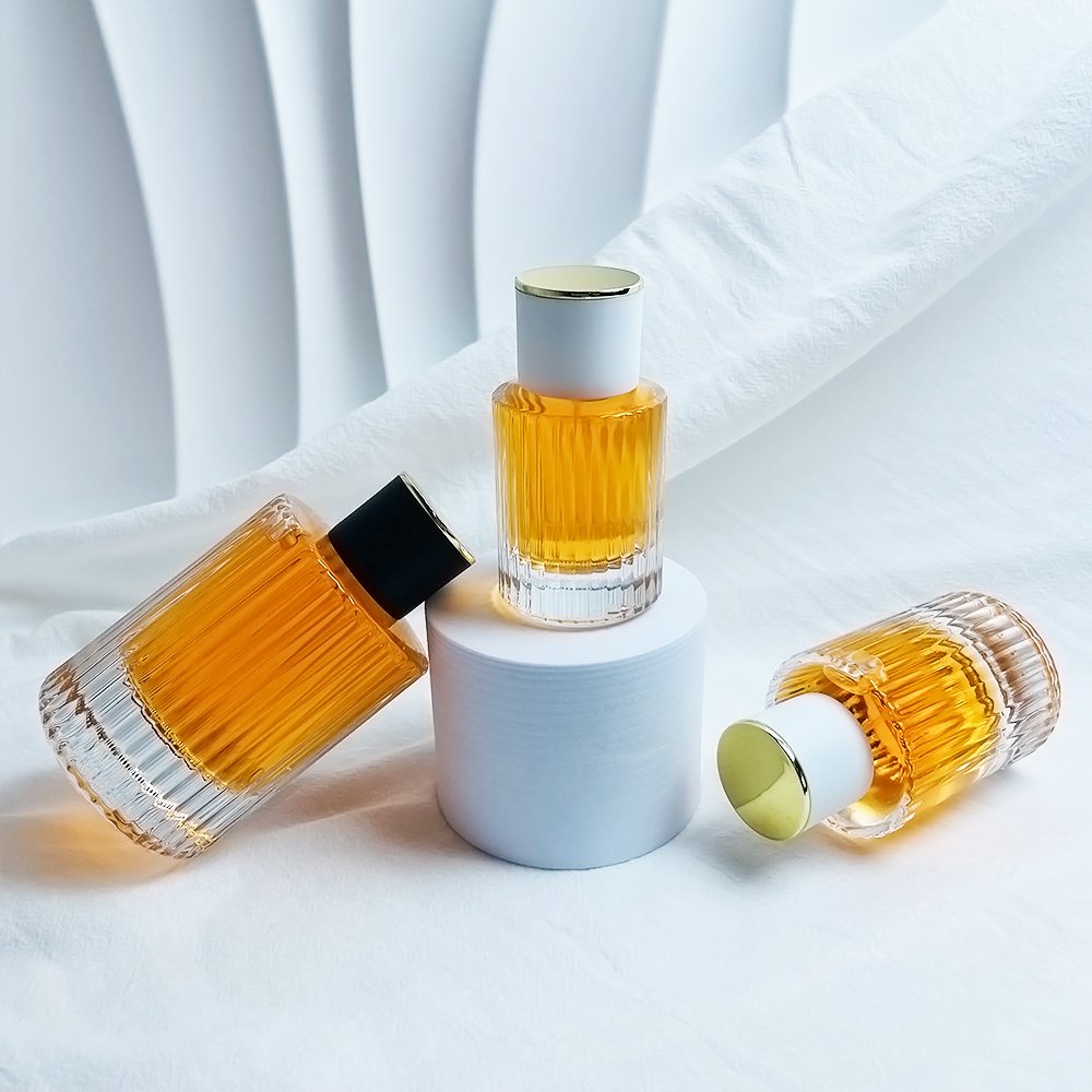 Luxury 30ml 50ml 100ml Round Shaped Empty Perfume Cylinder Glass Bottles Perfume Travel Refillable Bottle Manufacturer
