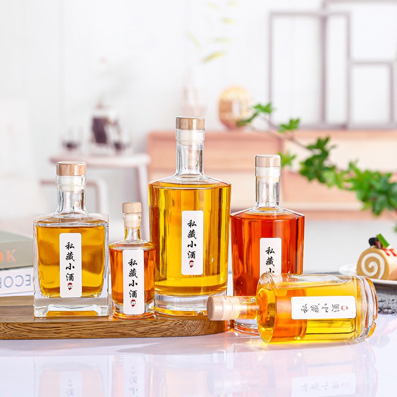 Wholesale 100ml 375ml 500ml 750ml glass empty bottles liquor wine gin whisky vodka spirits glass bottle with cork lid