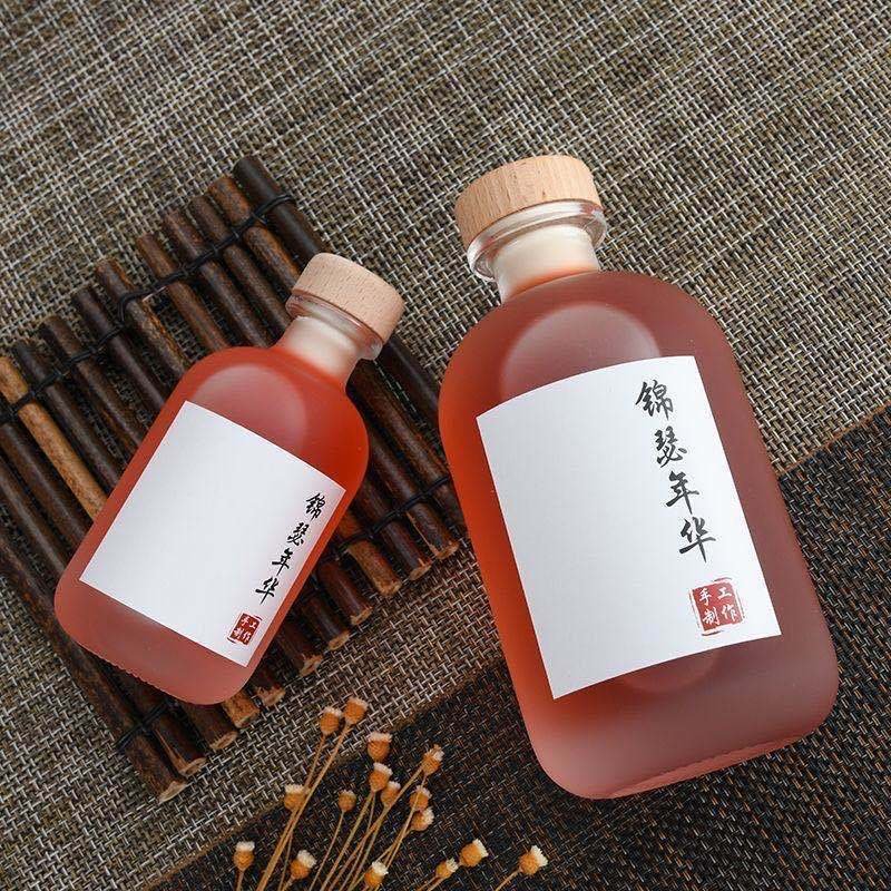 100ml 250ml 375ml 500ml Round Clear Frosted Wine Bottle Vodka Glass Bottle With Wooden Cork Stopper