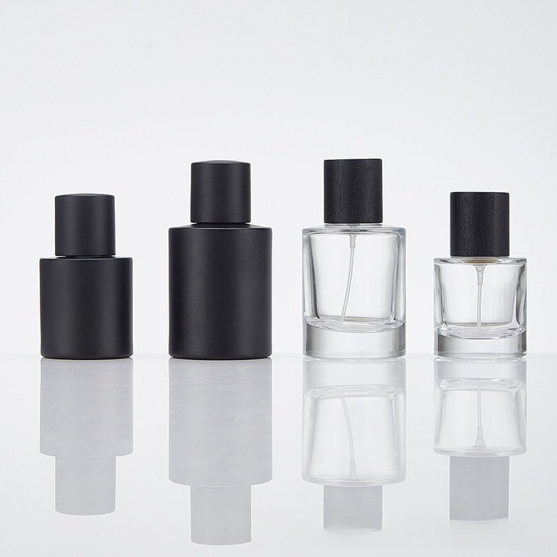 Wholesale Matte Black Glass Perfume Bottle 50ml Round Perfume Glass Bottle With Black Cap