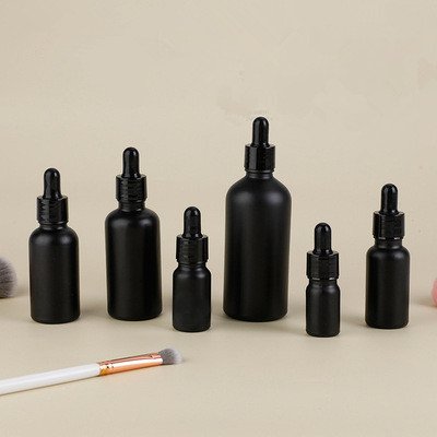 Wholesale tempered black essential oil glass dropper bottle empty 30ml matte black glass bottle with dropper