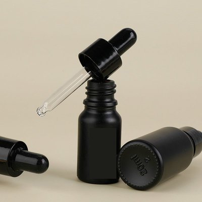 Wholesale tempered black essential oil glass dropper bottle empty 30ml matte black glass bottle with dropper