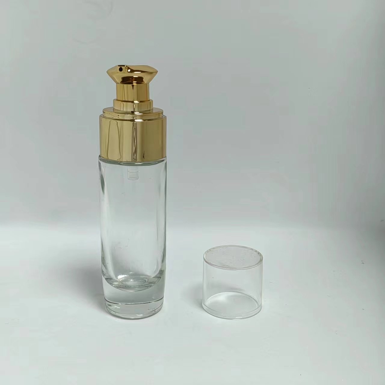 20ml 30ml clear frost glass pressing lotion pump cosmetics packaging skin care serum bottle with rose gold silver lid