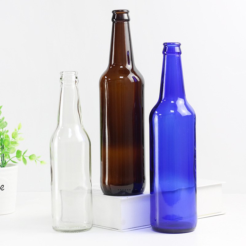 Wholesale Most popular clear drink 250ml 330ml transparent glass beer bottle with crown lid