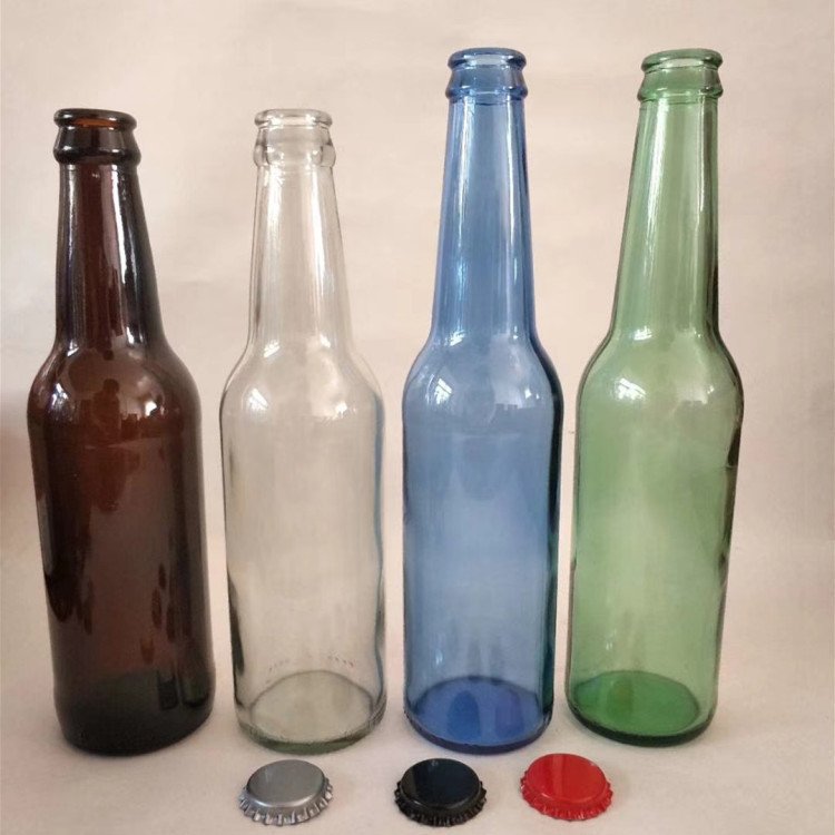 Wholesale Most popular clear drink 250ml 330ml transparent glass beer bottle with crown lid